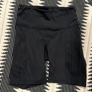 Athleta ultimate stash II 7” Short